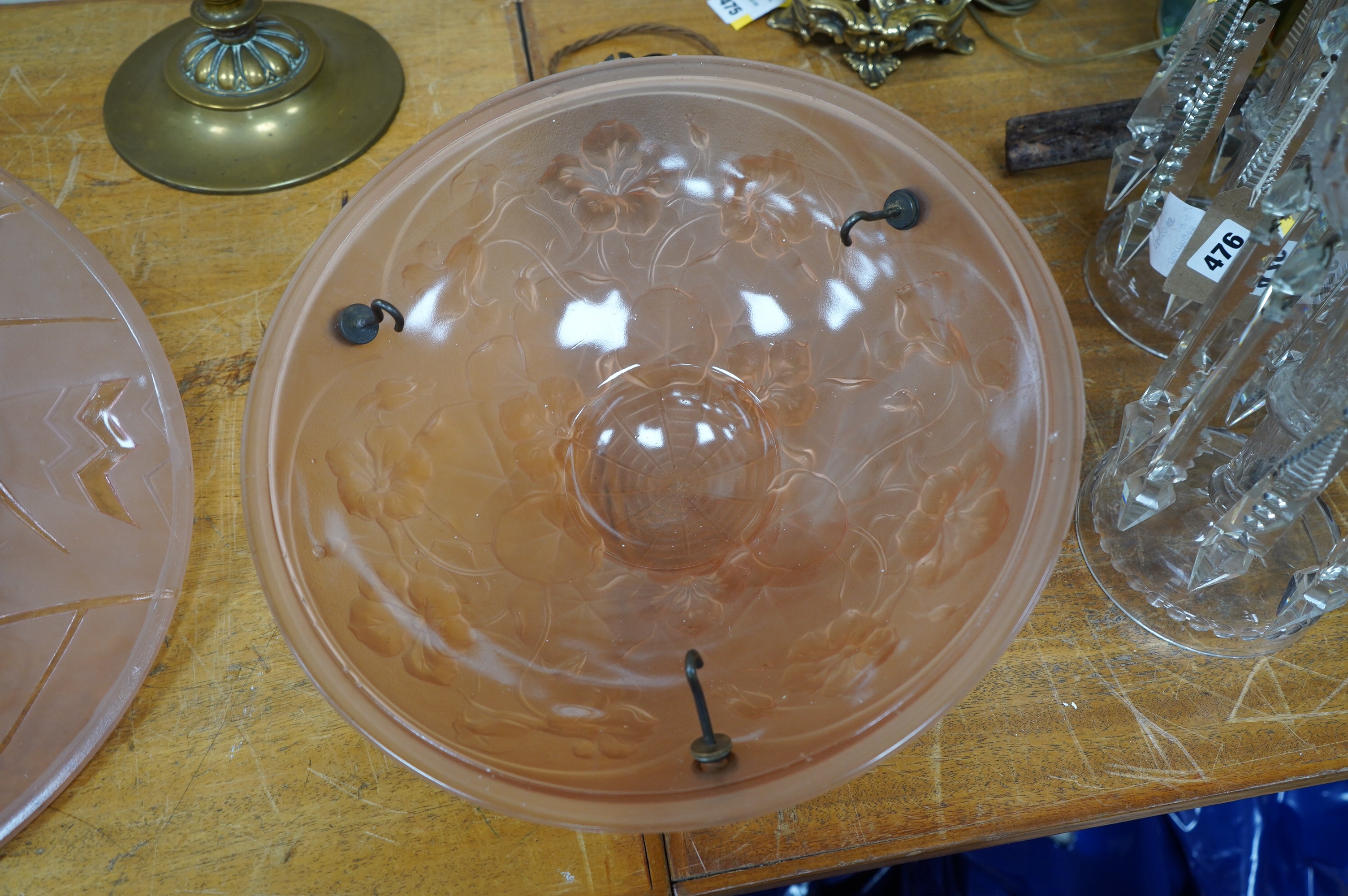 A French pink glass plaffonier ceiling lamp with antique brass fitting, chain and ceiling rose, circa 1930’s, wired, glass 35cm diameter, 13cm deep. Condition - good some minor chipping